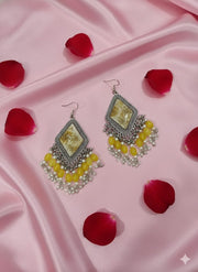 Handcrafted Yellow Baby’s Breath Resin Jhumka Earrings with Pearl Danglers