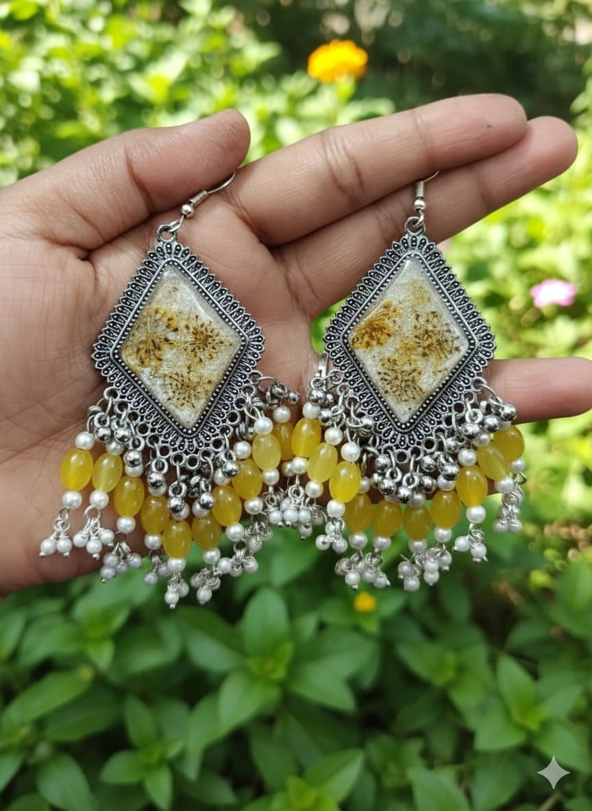 Handcrafted Yellow Baby’s Breath Resin Jhumka Earrings with Pearl Danglers