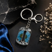 Blue Flower Resin Alphabet Keychain – Stylish Bag & Car Charm